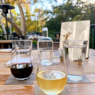 three glasses of wine on a table