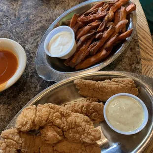 Chicken tenders and sweet potato fries