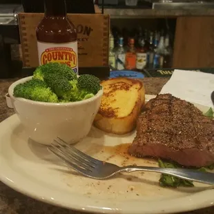 KC Strip steak and fresh broccoli.