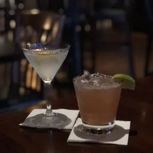 two cocktails on a table