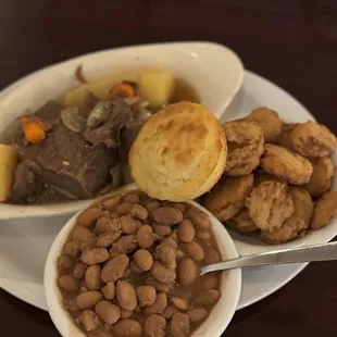a plate of food with beans and biscuits