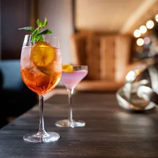 two cocktails on a table