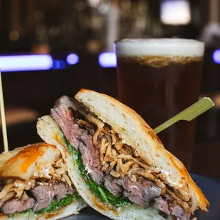 a roast beef sandwich and a pint of beer
