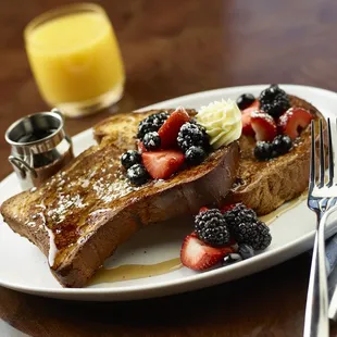 Henry&apos;s Big Brioche French Toast (maple syrup, fresh berries, whipped butter)