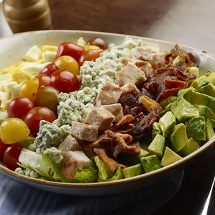The Henry Cobb Salad (grilled chicken, romaine, bacon,
blue cheese, heirloom tomato, hard-boiled egg, avocado)