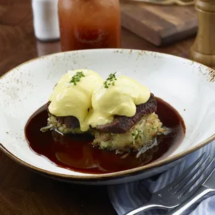 Signature Short Rib Benedict (braised short rib, soft poached eggs, hollandaise, hashbrowns)