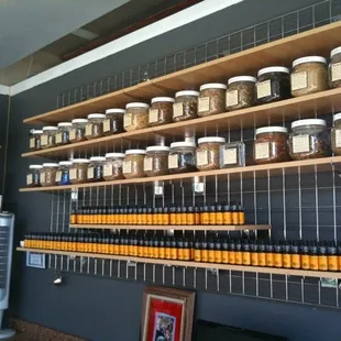 a wall of jars of herbs