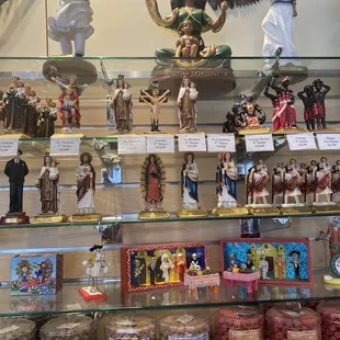 a variety of religious figurines