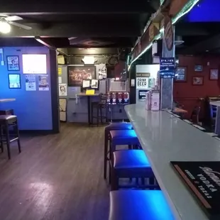 Looking down the bar. Some very cool retro litho prints.