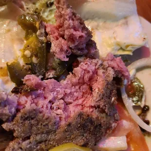 a plate of meatloaf and vegetables