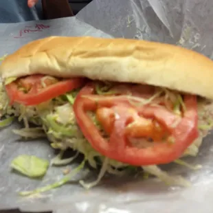 7 1/2 inch tuna. My 12 year old finished the whole thing and loved every messy bite!