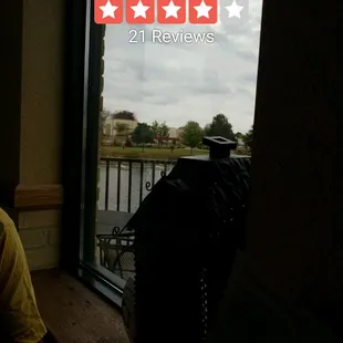 a man looking out a window