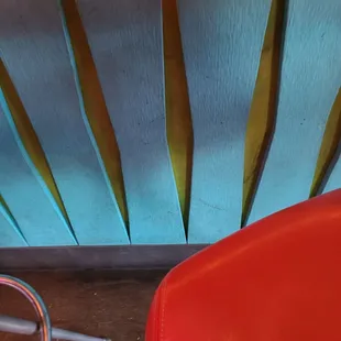 a close up of a red chair