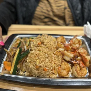 Shrimp hibachi with fried rice and veggies.
