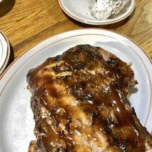 Full slab of ribs, baked potato
