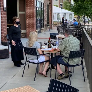 a group of people sitting at a table