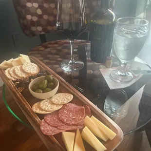 Cheese board with salami! The smoked Gouda and the parm cheese! YUM! Also the three finger jack Cabernet Sauvignon!