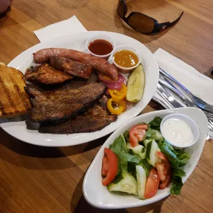 a plate of meat and vegetables