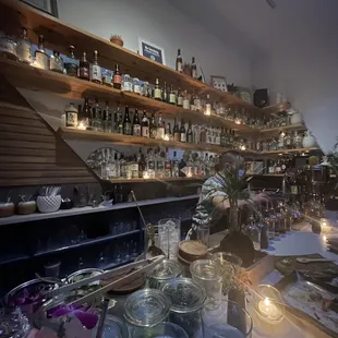 a bartender pouring a drink at a bar