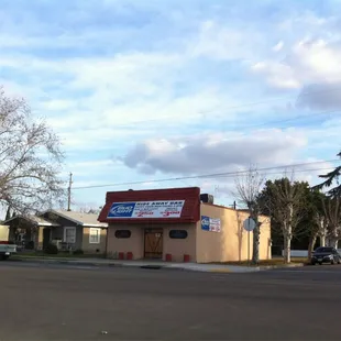 a small business on the corner of a street