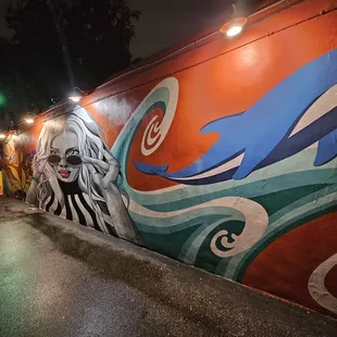 a mural of a woman&apos;s face