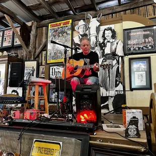 a man playing guitar