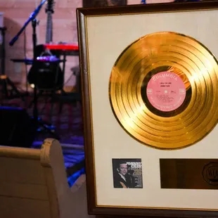 Johnny's golden record hangs on the wall of the museum
