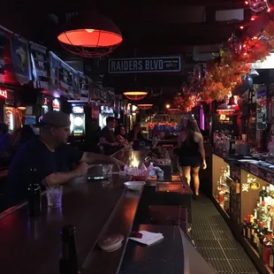 people sitting at a bar