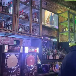 a man standing at a bar