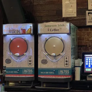 two vending machines on a counter