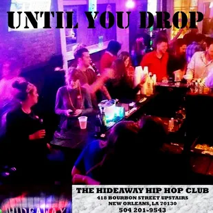 a group of people at a bar