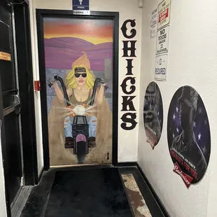 a woman on a motorcycle