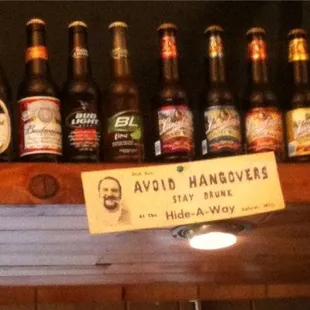 a shelf full of beer bottles
