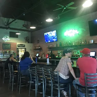 people sitting at the bar