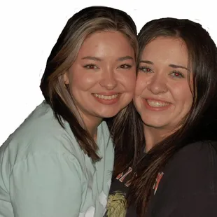 two women hugging each other