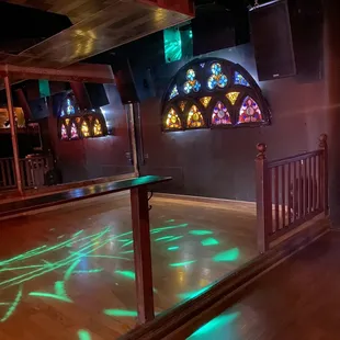 a dance floor with neon lights