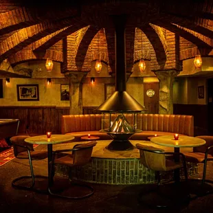 a fireplace in the middle of the room