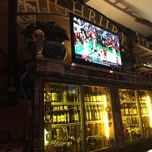 a large television in a bar