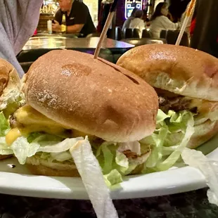 Lander Babies: Four Slider Burgers topped with Lettuce, American Cheese and BG&apos;s Lander Sauce