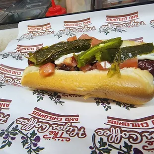 a hot dog with toppings