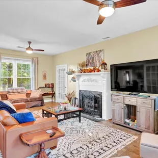 Sitting Room with large flat screen TV and plenty of space to sit