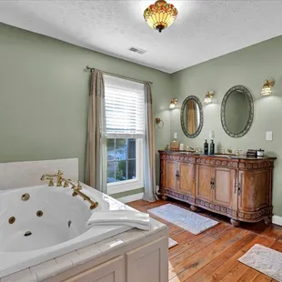 Dogwood bathroom with full tub and double sinks