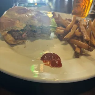 Tavern, Tavern burger with fries and a quarter of buffalo wings with a side of fries.