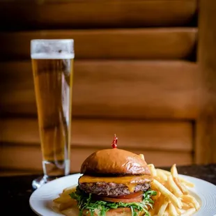 a hamburger and fries on a plate