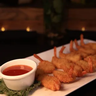 a platter of deep fried shrimp