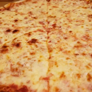 Close up of the cheesy pizza