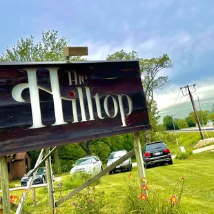 a sign for the hilltop