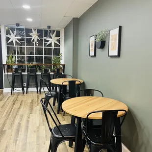 a row of tables and chairs