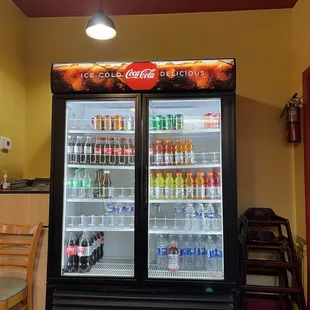 a soda cooler in a restaurant