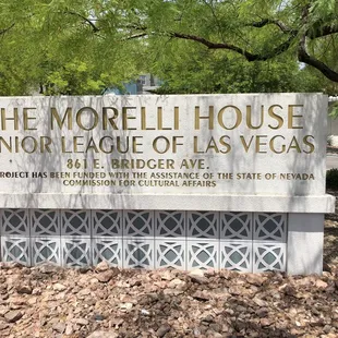 The Junior League sign at the corner of the house at 9th and Bridger.